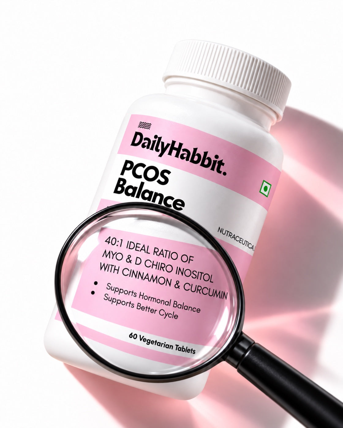 DailyHabbit PCOS Balance bottle with a magnifying glass highlighting its 40 to 1 inositol formula